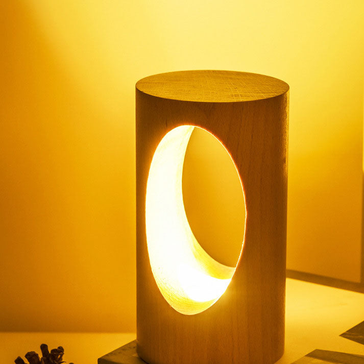 LumiGlow – Elegant cylindrisk bordlampe med oval udskæring til blød belysning
