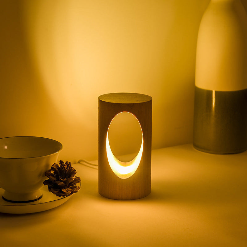 LumiGlow – Elegant cylindrisk bordlampe med oval udskæring til blød belysning