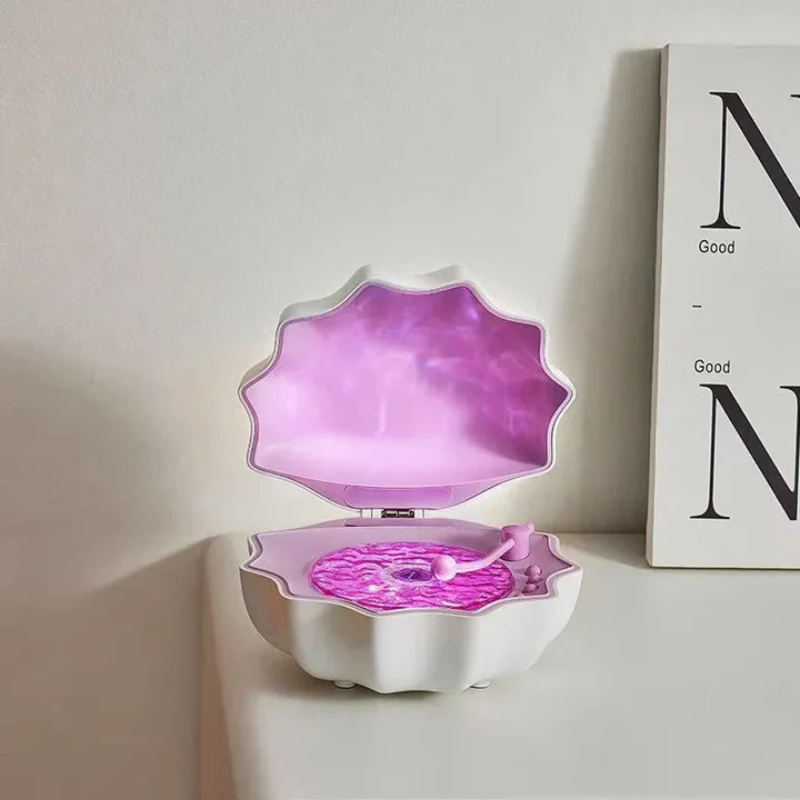 HavenGlow - Muslingeinspireret lampe med Bluetooth-højttaler
