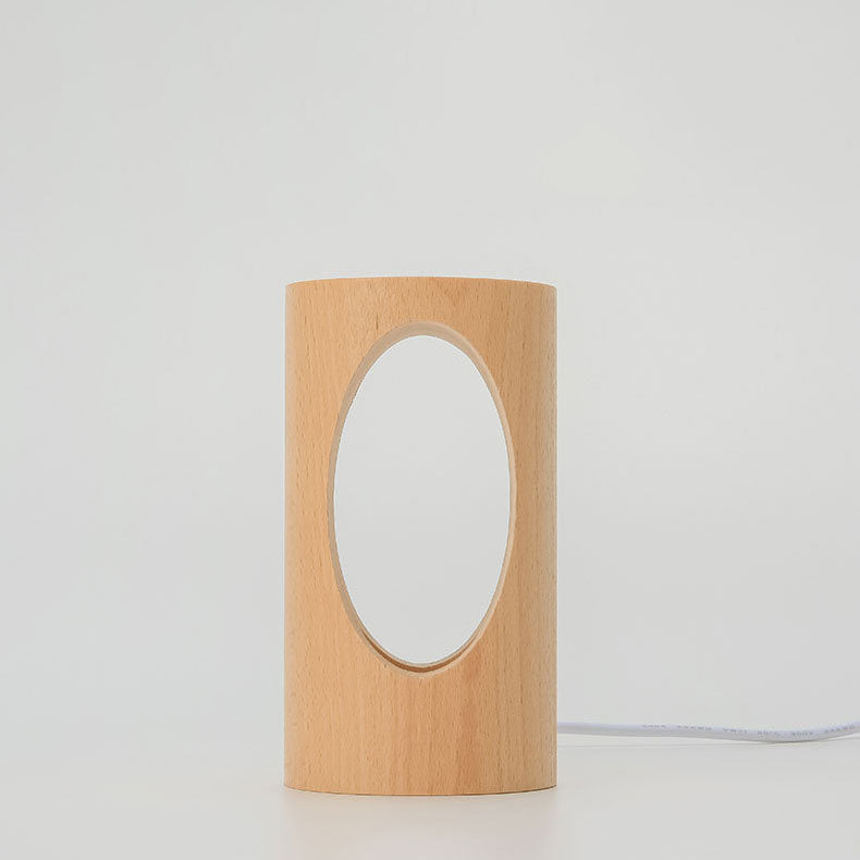 LumiGlow – Elegant cylindrisk bordlampe med oval udskæring til blød belysning