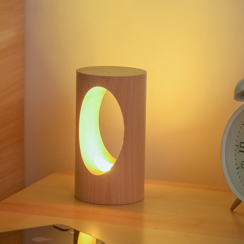 LumiGlow – Elegant cylindrisk bordlampe med oval udskæring til blød belysning
