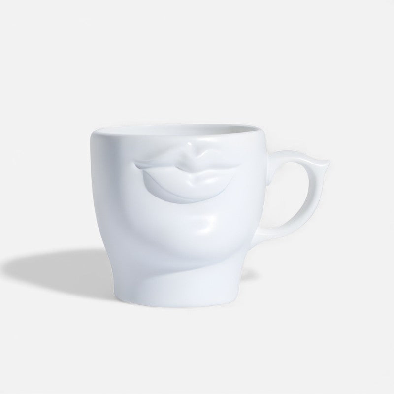FaceSip - Kreativ Kop med Ansigts formet Design