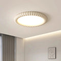 ZenHalo – Loftlampe med krusningsinspireret form og rolig belysning ovenfra