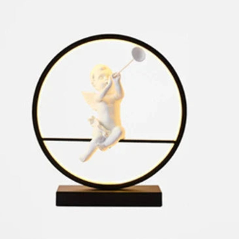 AuraRing - Kunstnerisk LED-bordlampe med englefigur og lysende cirkulær ramme