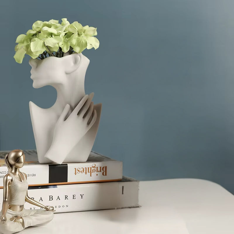 ArtFace – Stilfuld vase med stiliseret ansigtsmotiv til moderne boligindretning