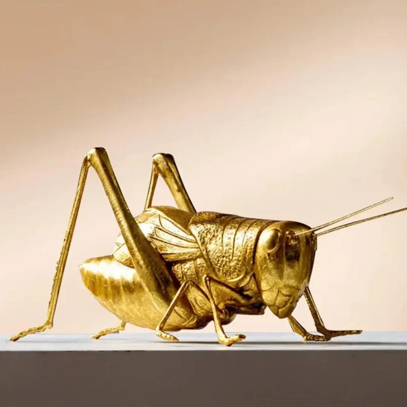 InsectaLuxe – Guldskulpturer af knæler, græshoppe og bi