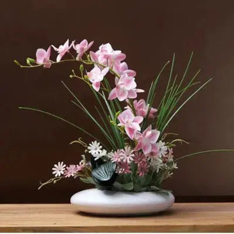 BloomNest – Elegant vase med naturtro orkideopsætning til moderne indretning