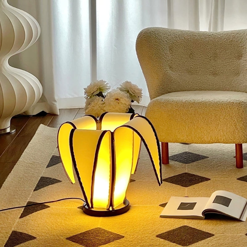 BananaGlow – Justerbar bananformet bordlampe med lynlåsdetaljer