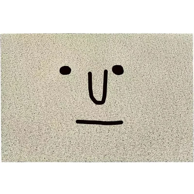 CheekyMat - Moderne dørmåtte med smiley design og skridsikker overflade