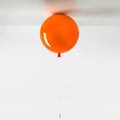 LumoBalloon – Ballonformet loftslampe med legende, moderne silhuet