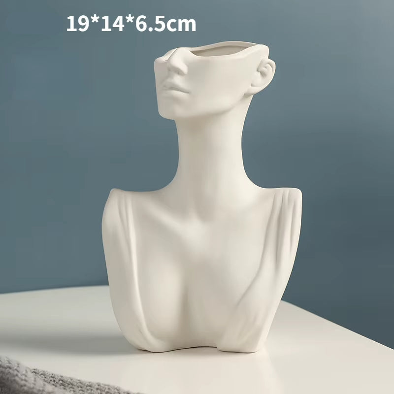 ArtFace – Stilfuld vase med stiliseret ansigtsmotiv til moderne boligindretning