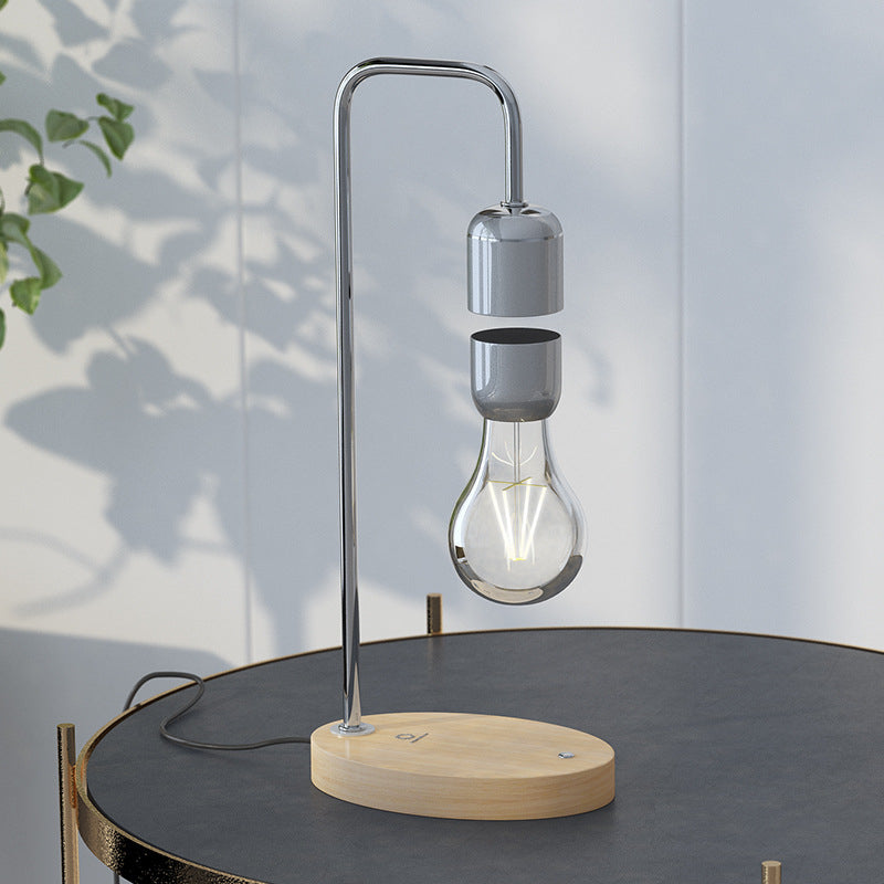 LumoFloat – Svævende lampe med magnetisk svævende design og trådløs opladningsbase