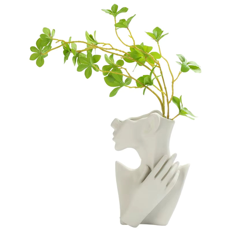 ArtFace – Stilfuld vase med stiliseret ansigtsmotiv til moderne boligindretning