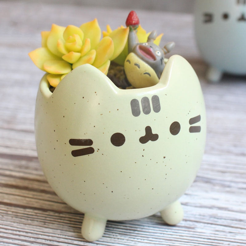 PurrNest – Legesyg katteformet plantekasse med unikt design