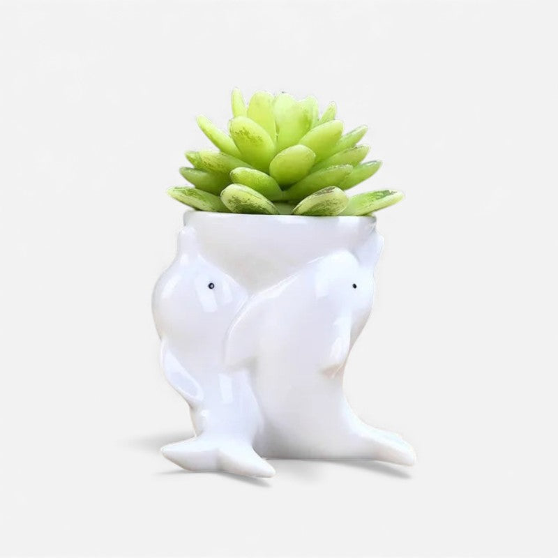 AquaForm – Dekorativ blomsterpotte med delfininspireret design