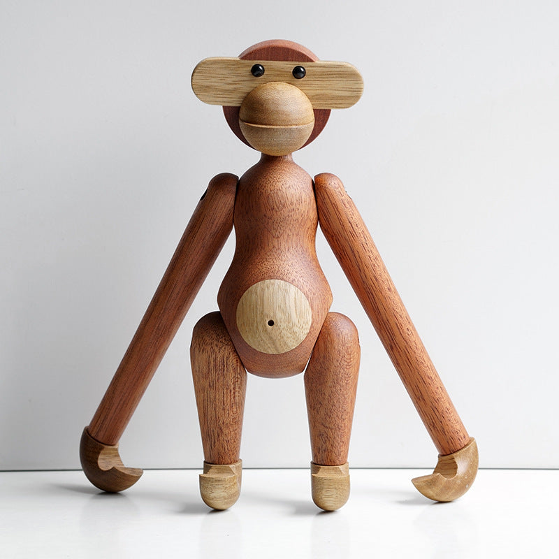 CheekyCharm - Playful abe ornament med et unikt og kunstnerisk design