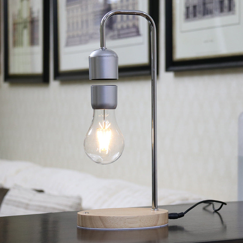 LumoFloat – Svævende lampe med magnetisk svævende design og trådløs opladningsbase