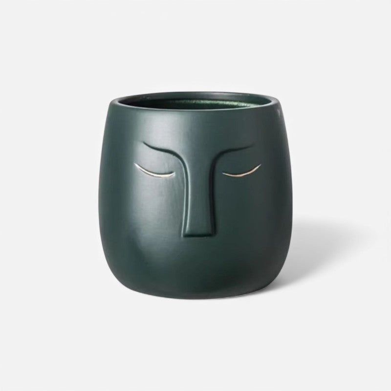 FloraFace - Dekorativ Blomsterpotte med Ansigtsinspireret Design