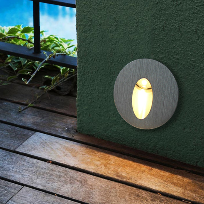 LumiGlow – moderne væglampe med oval åbning til blød og elegant omgivende belysning
