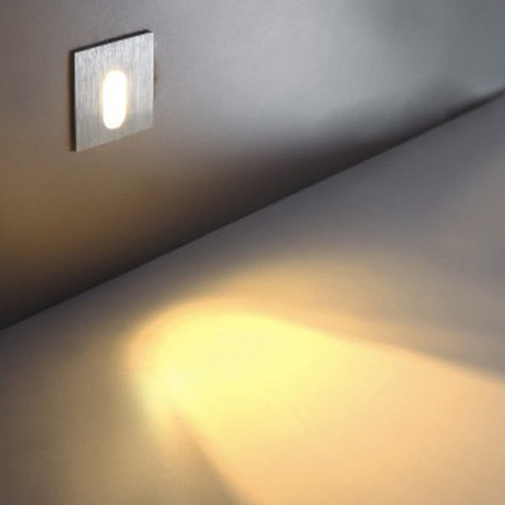 LumiGlow – moderne væglampe med oval åbning til blød og elegant omgivende belysning