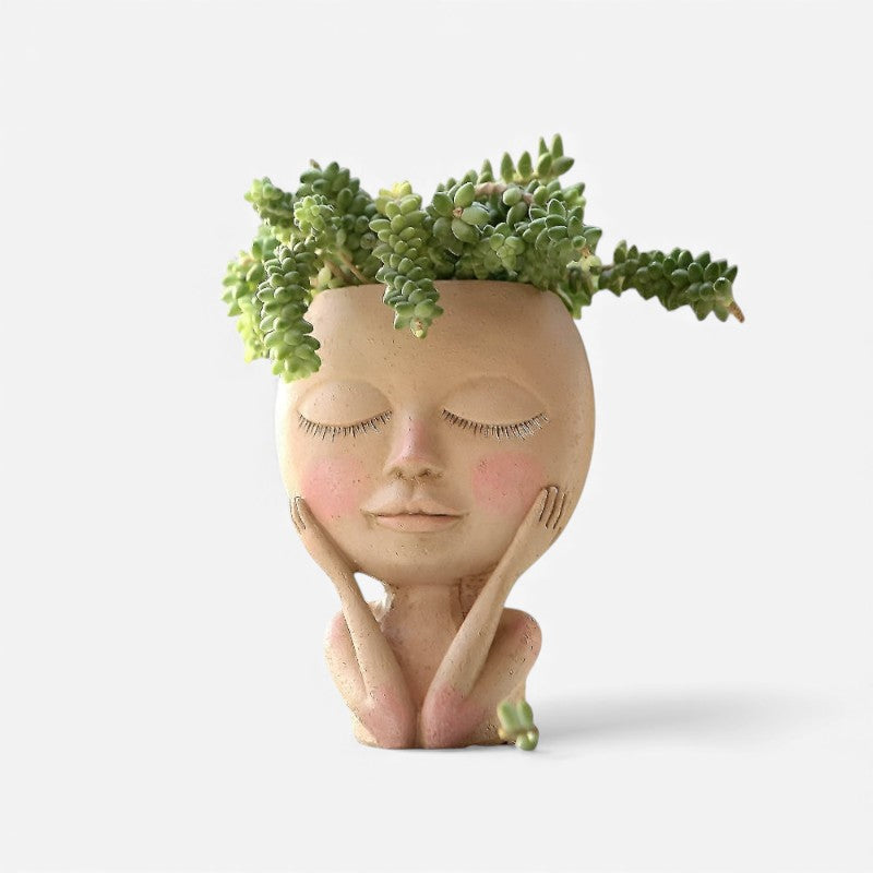 FloraFace – Dekorativ ansigtsformet blomsterpotte til udendørs brug