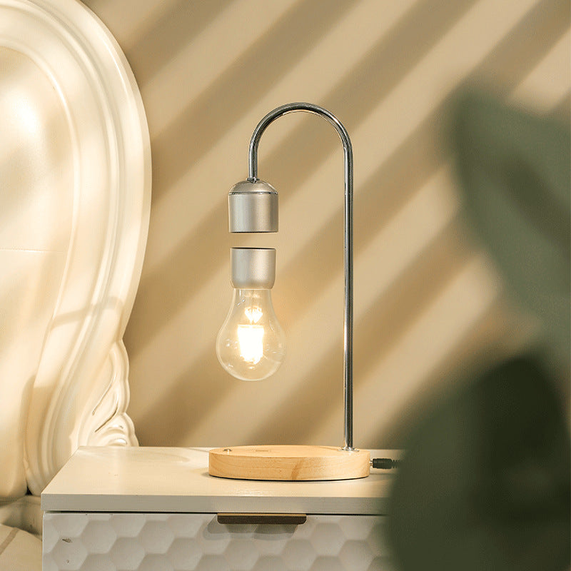 LumoFloat – Svævende lampe med magnetisk svævende design og trådløs opladningsbase