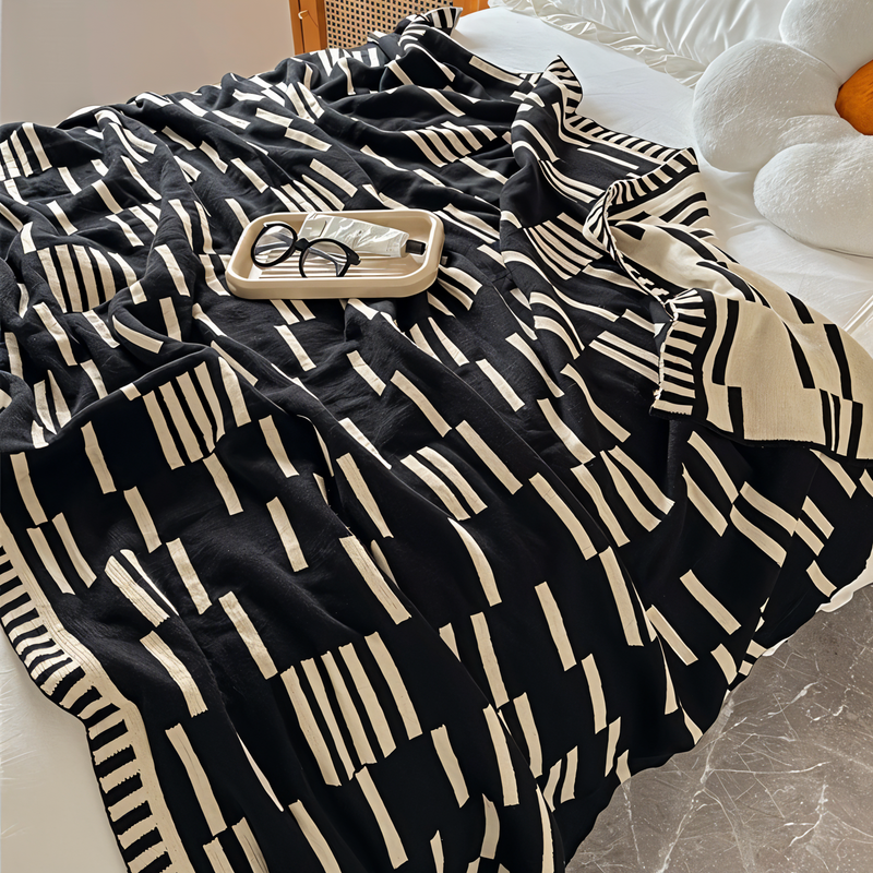 ComfyNest – Blødt tæppe med elegant stribet design for hyggelig komfort