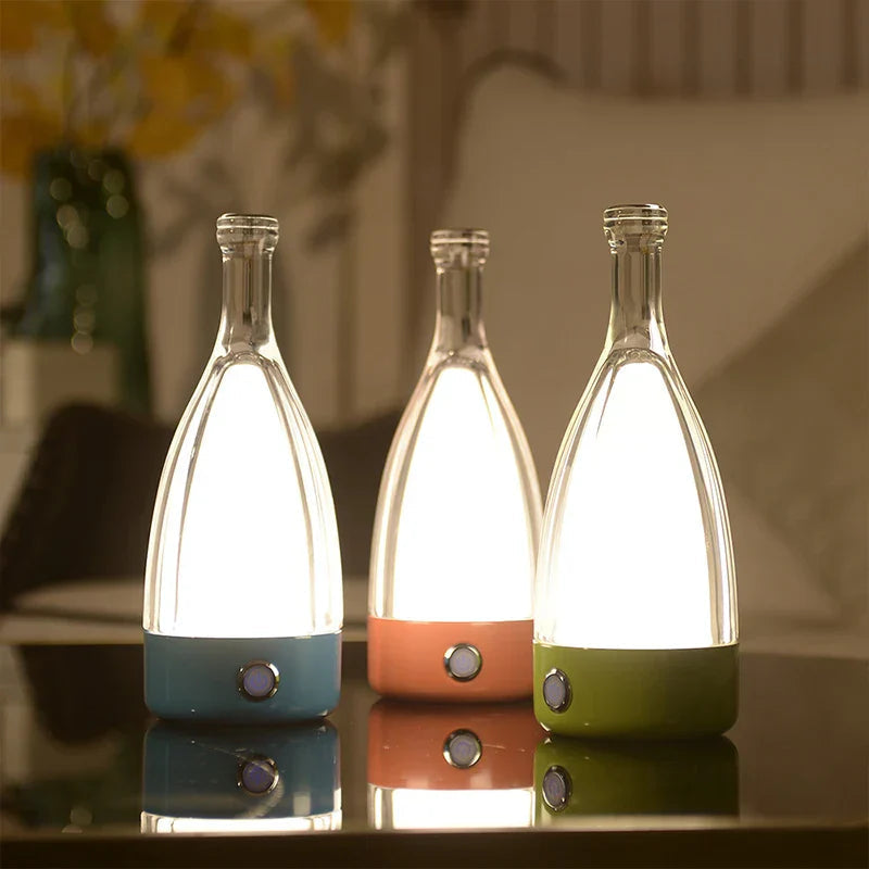 LumoBottle – Moderne bordlampe i form af en flaske med dæmpbart LED-lys til stuer og sociale rum