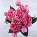 BlossomCharm - Elegant buket med et delikat rose- og gypsophila-arrangement