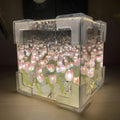 BloomAura - LED-gaveæske med lysende silkeblomsterarrangement
