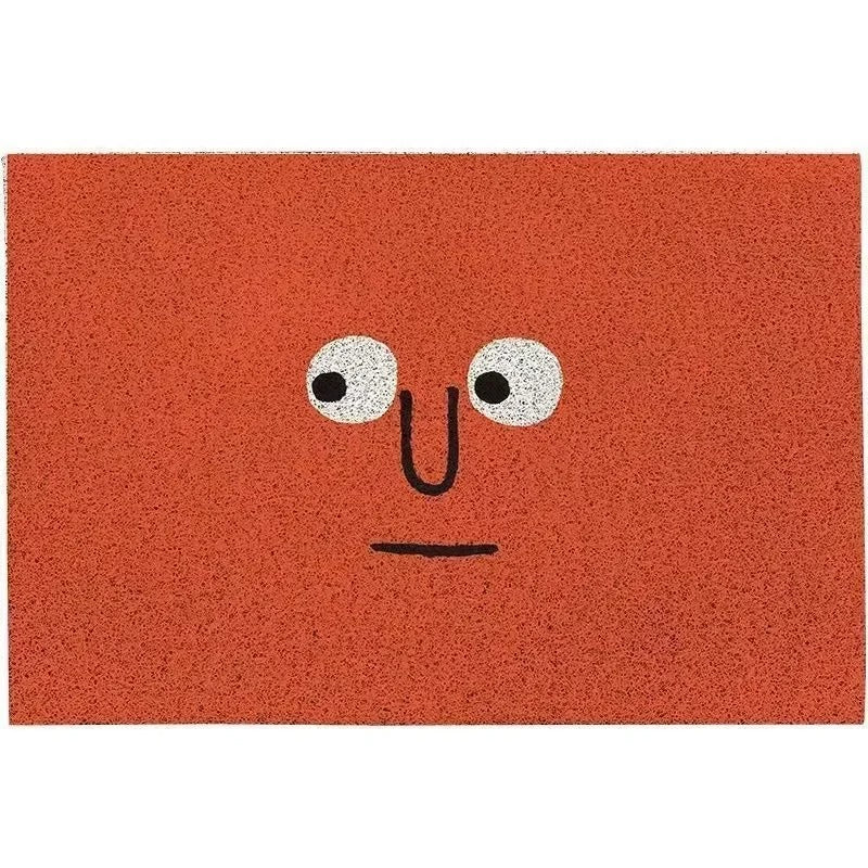 CheekyMat - Moderne dørmåtte med smiley design og skridsikker overflade