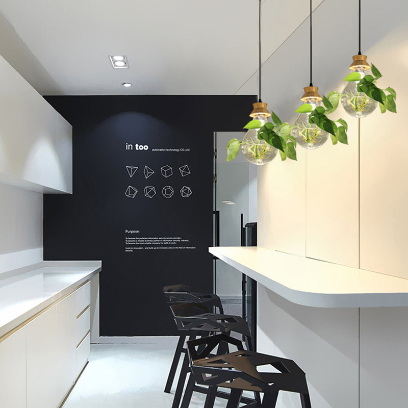 AviaryLuxe – Hængende plantelampe med fugleburdesign til elegant omgivende belysning