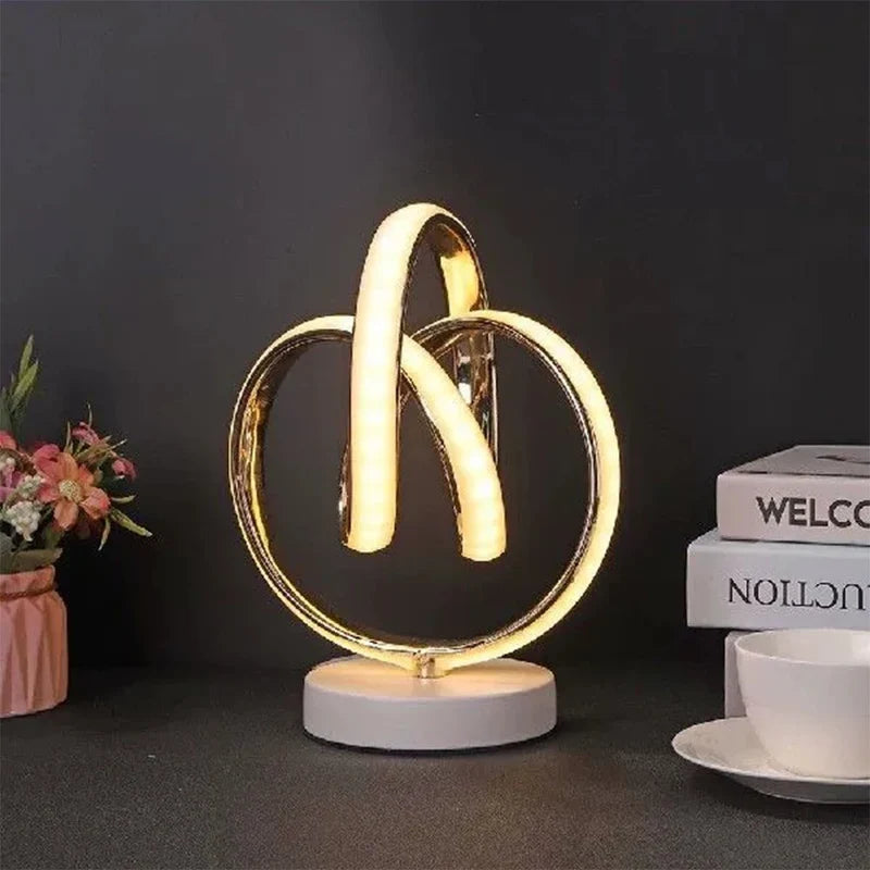 LumoGlow – Buet minimalistisk LED-bordlampe med slank bue til moderne rum
