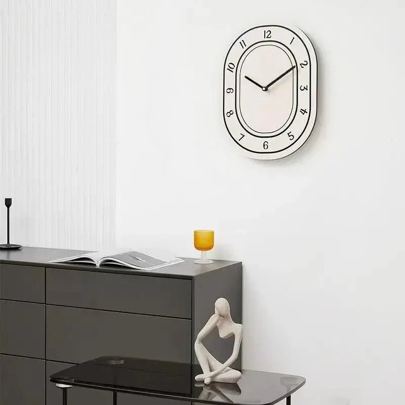 EllipTime - Minimalistisk elliptisk vægur med moderne elegance