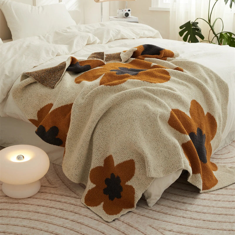 FloraNest – Blødt tæppe med blomstermønster til seng og sofa